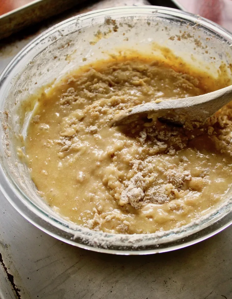 Gently mixing batter in mixing bowl.