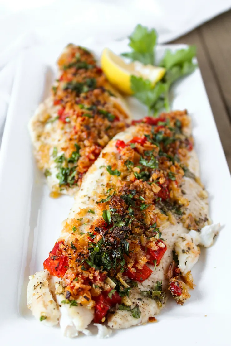 Greek baked fish on serving platter.
