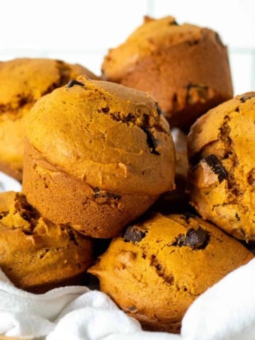 Basket full of pumpkin muffins.