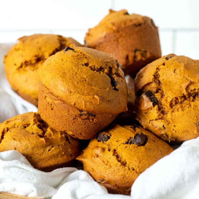 Basket full of pumpkin muffins.