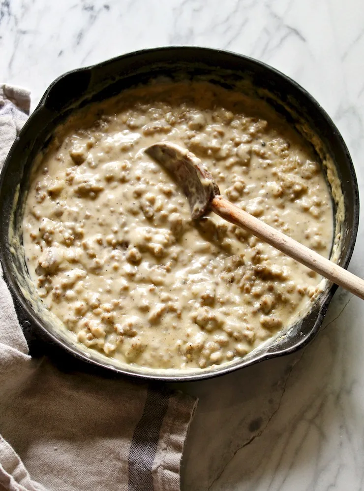 Sausage Gravy and Biscuits, finished sausage gravy in cast iron skillet