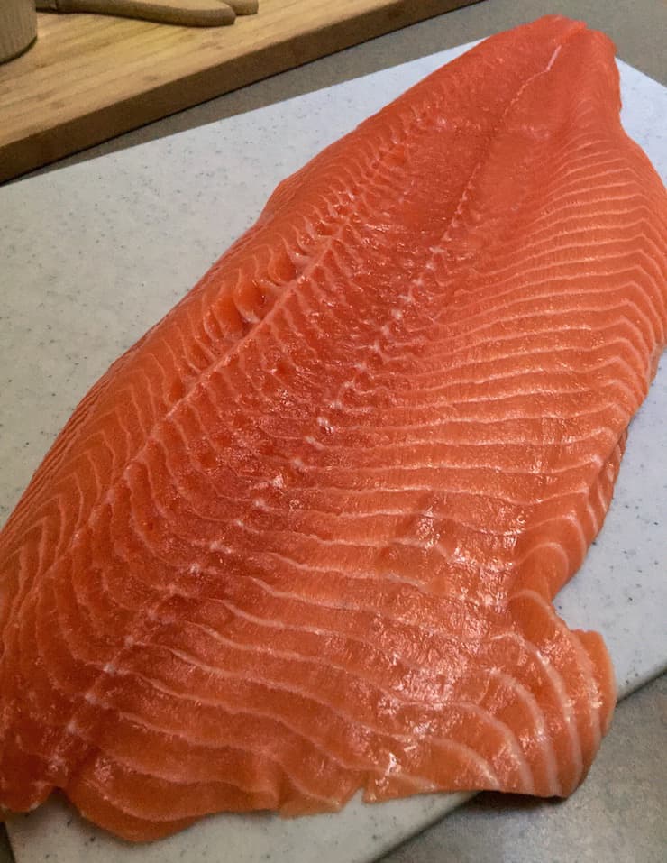 Roasted Glazed Salmon, piece of whole salmon on cutting board