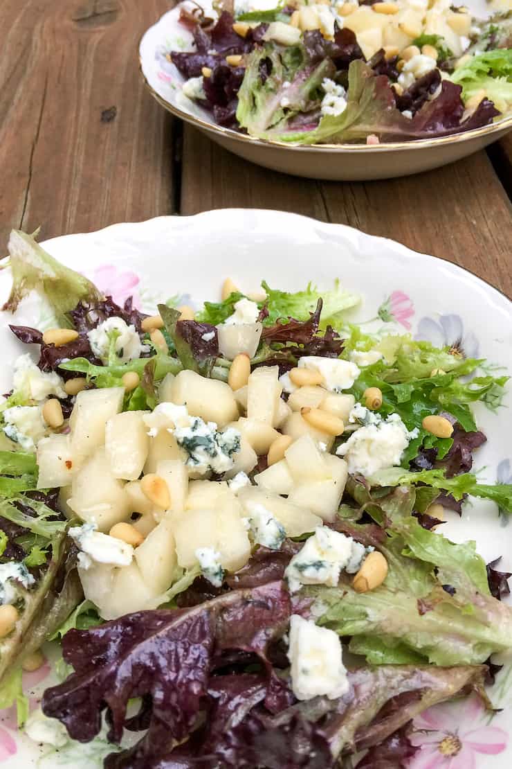 Pear and Blue Cheese Salad on china plates.