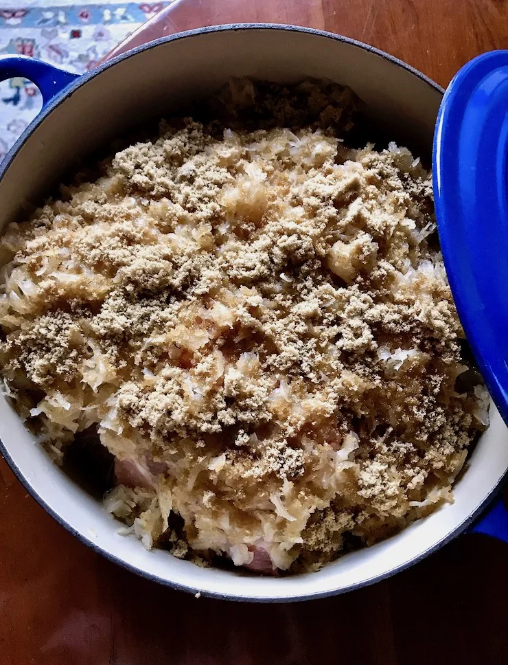 In dutch oven layered with brown sugar before going in oven