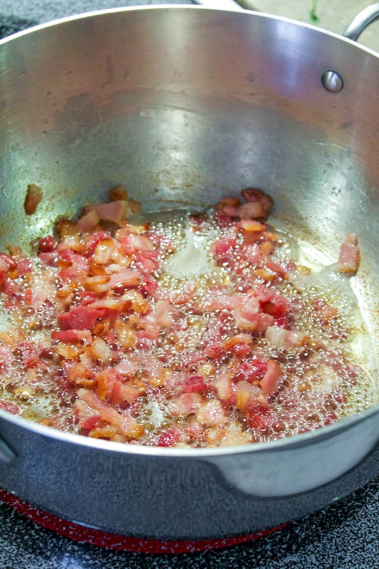 Bacon cooking to render fat needed for browning.