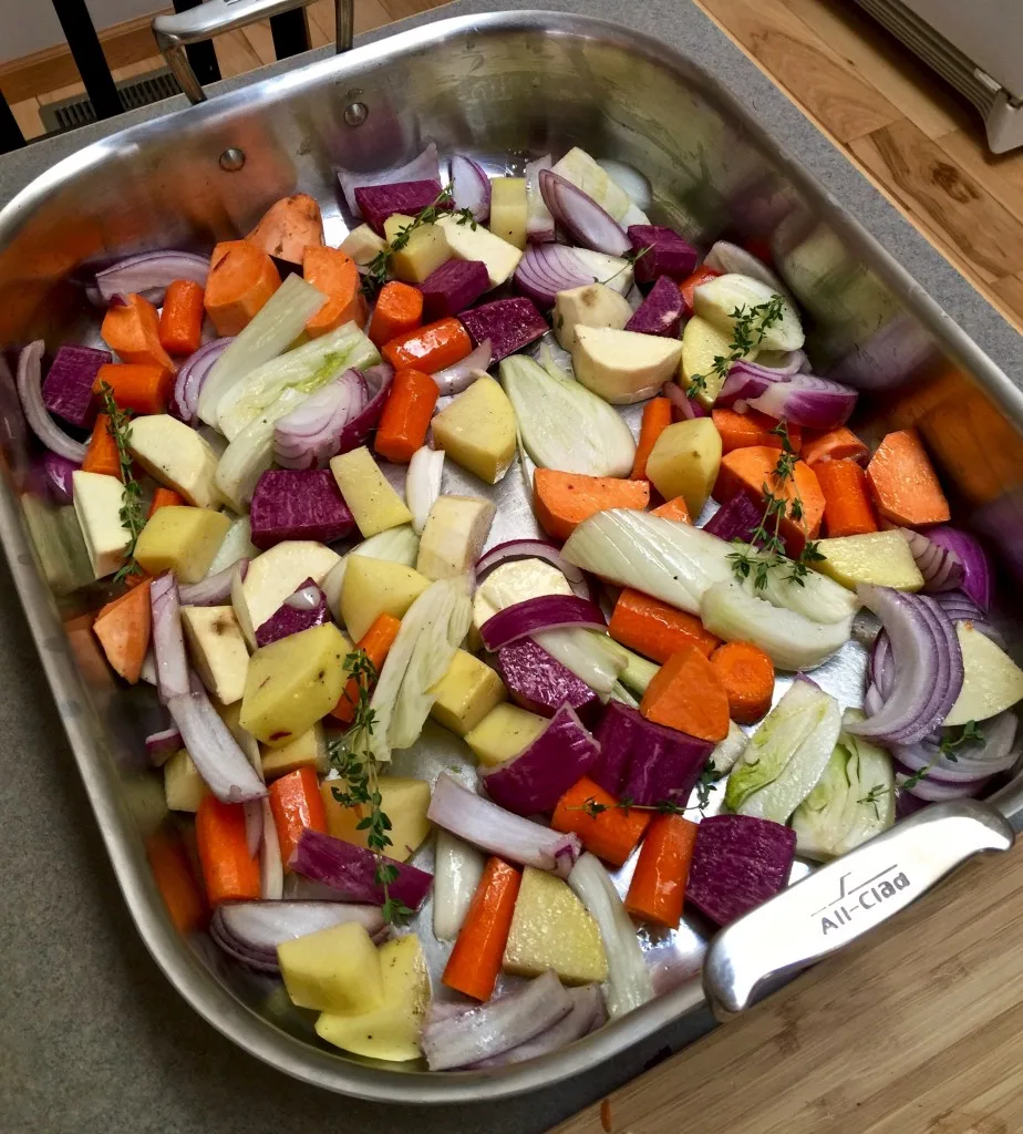 Root vegetables in roasting pan.