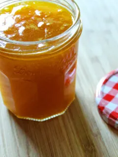Apricot jam in glass jar.