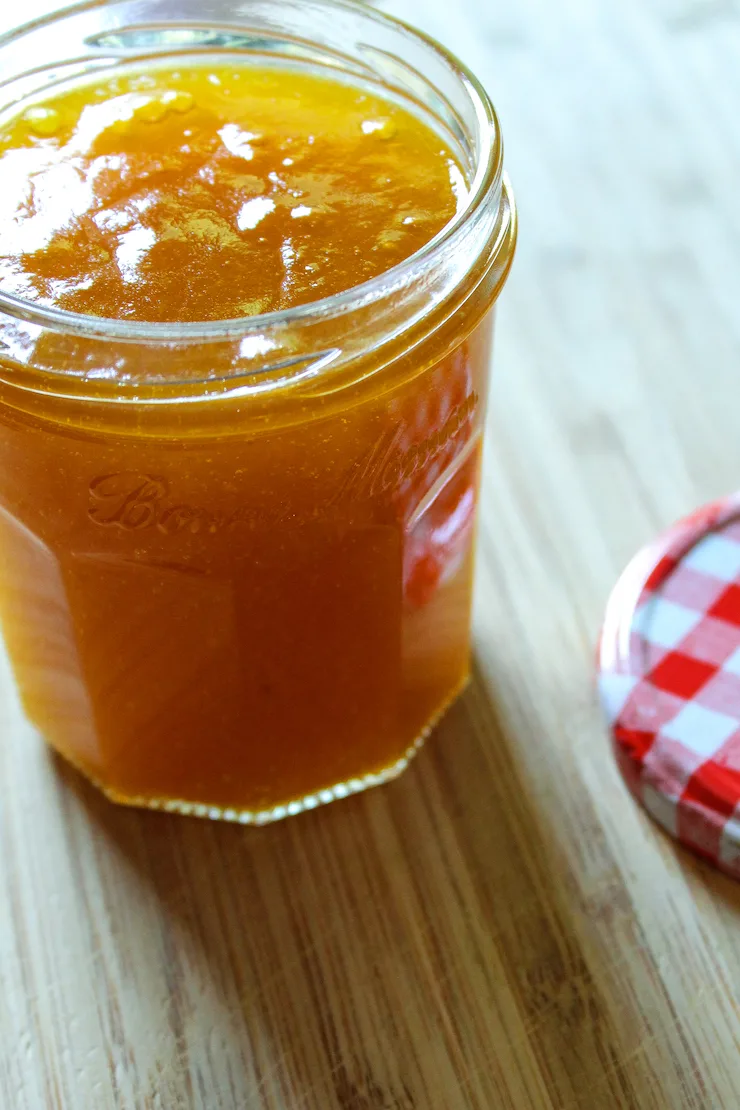 Apricot jam in glass jar.