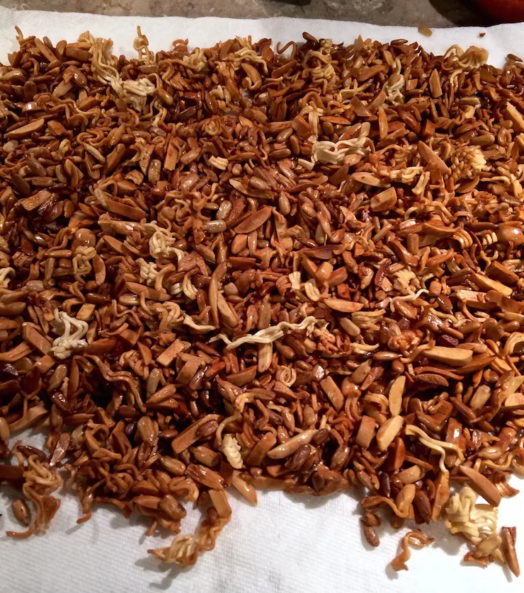 Napa Cabbage Salad, browned ramen noodles and nuts, draining on paper towel.