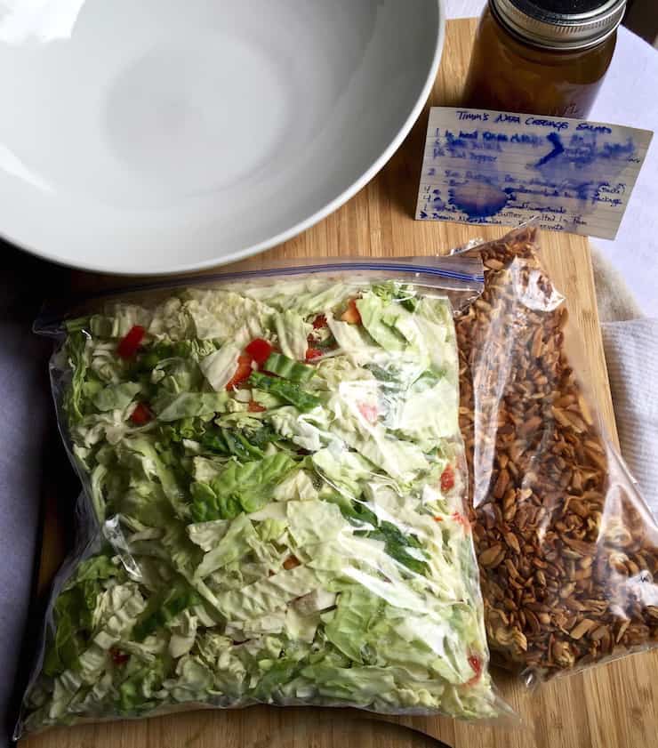 Napa Cabbage Salad, ingredients prepped in storage bags, dressing and recipe card.