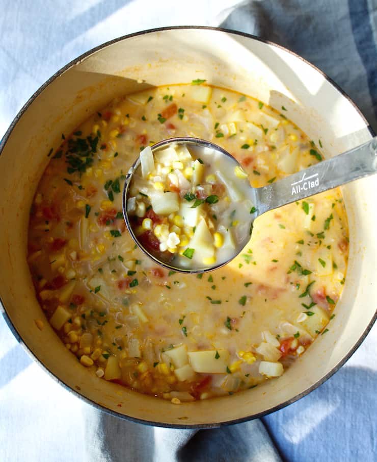 Summer Corn Chowder in pot with ladle