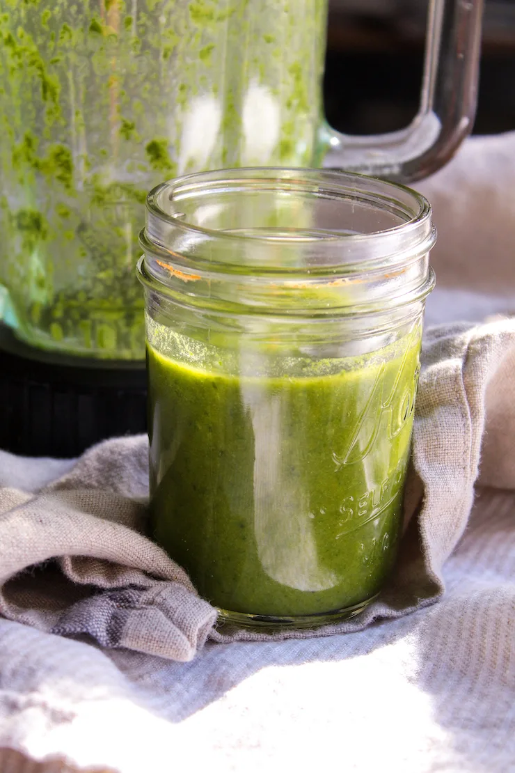 Basil vinaigrette in jar.