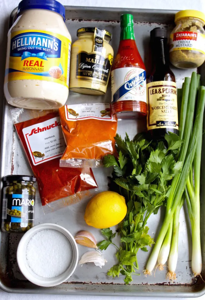 Ingredients for remoulade sauce on display in sheet pan.