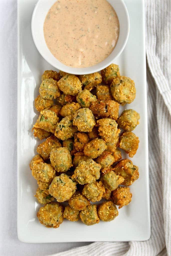 Fried Okra with Louisiana Rémoulade on white serving platter.