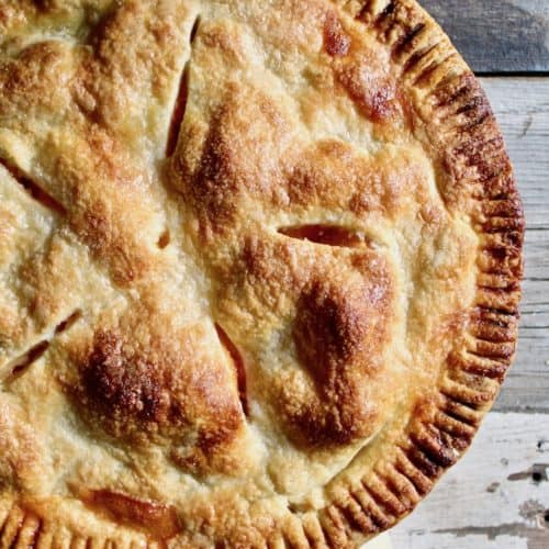 Peach Pie, overhead close up photo of baked pie