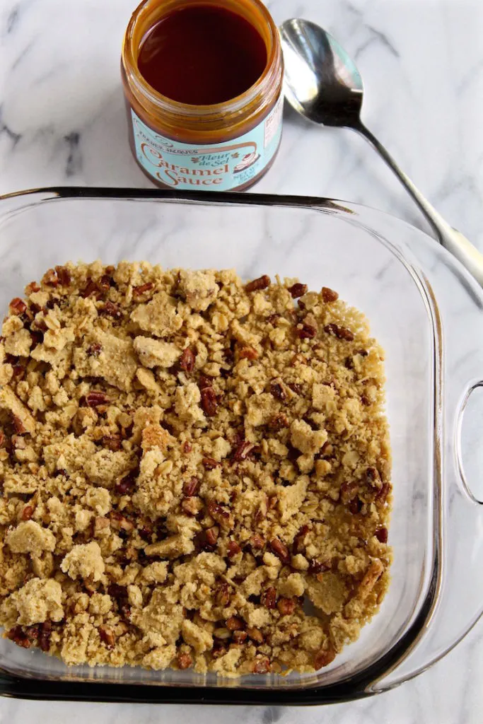 Crumbles in baking dish ready for layering.