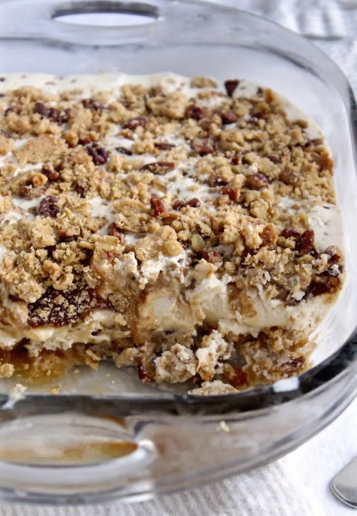 Butterscotch Crunch Squares in pan with slice cut out.