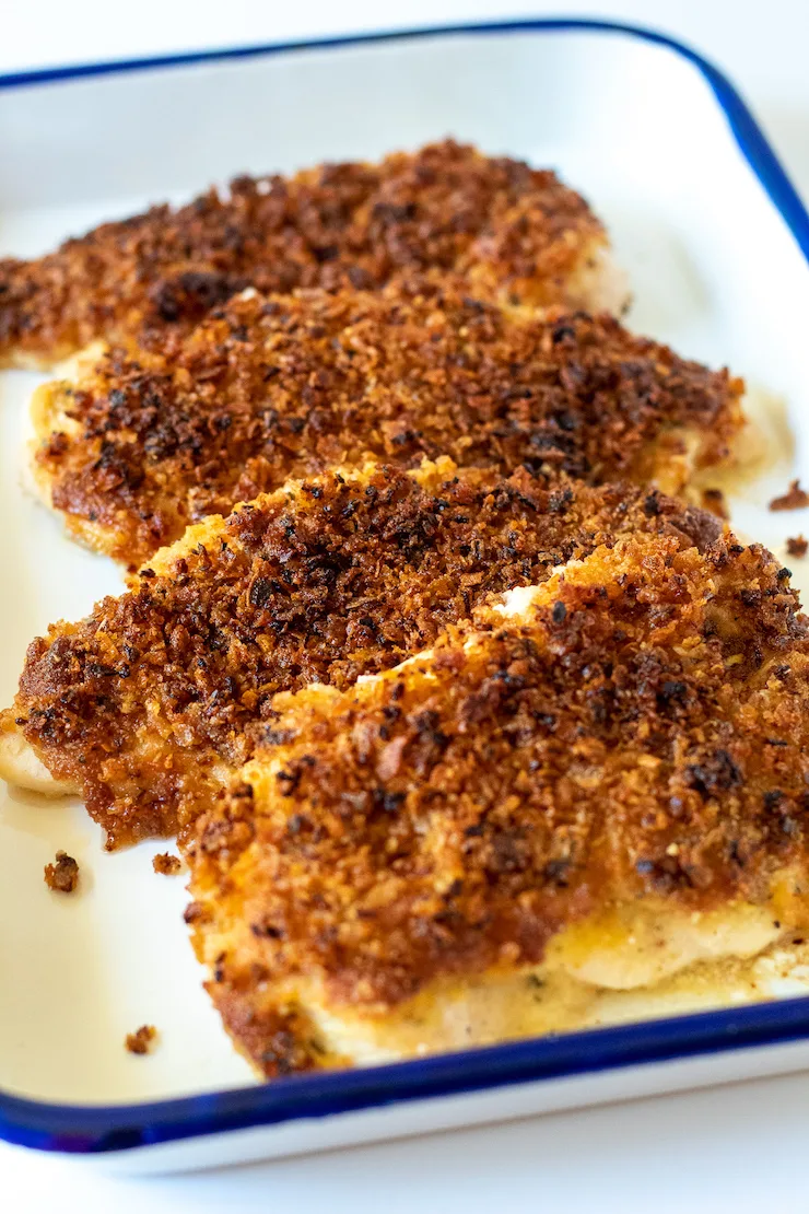 Onion Parmesan Chicken in serving pan.