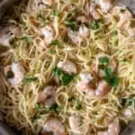 Shrimp Scampi with linguine, overhead photo in pan.