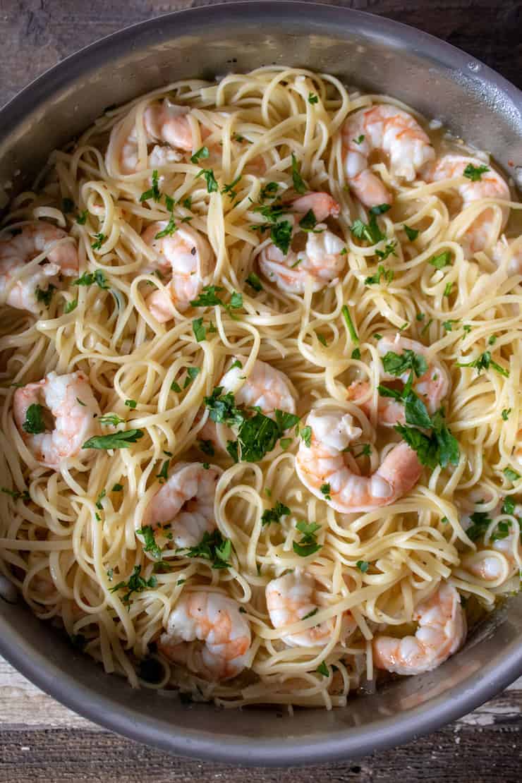 Shrimp Scampi with linguine, overhead photo in pan.