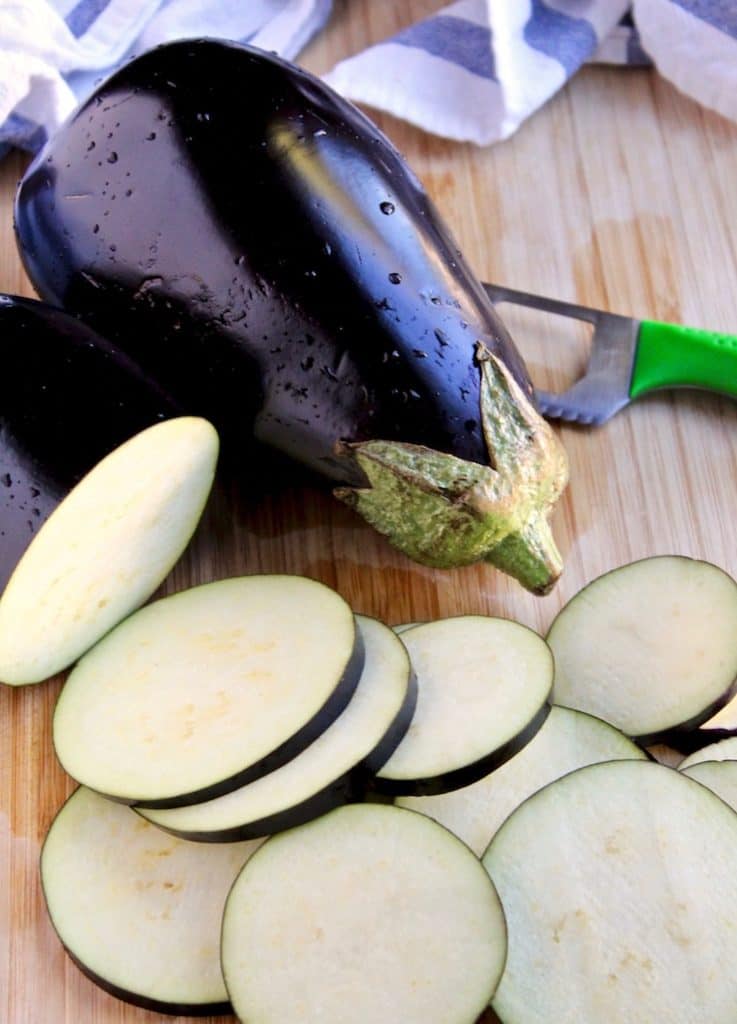 Purple eggplant globe and slices