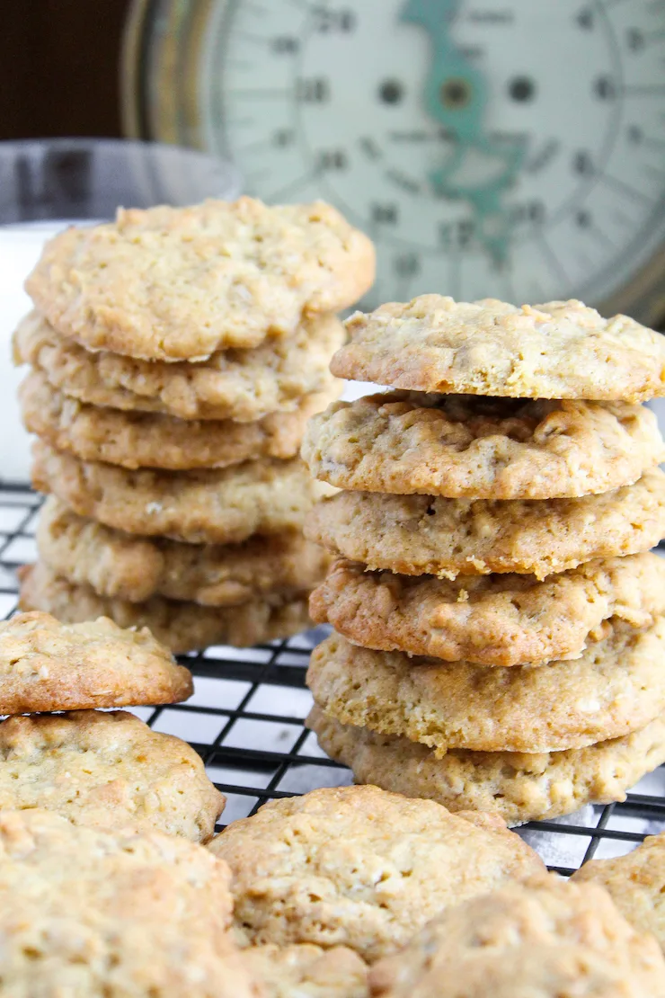 Cookies stacked on wire rack.