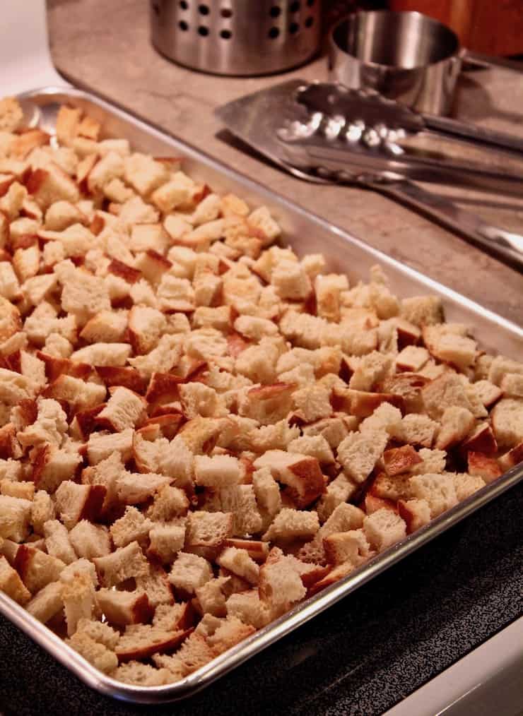 Sheet pan of toasted fresh bread cubes.