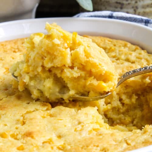 Close up of spoonful of corncasserole.