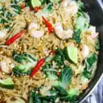 Pad see ew with shrimp in pan.