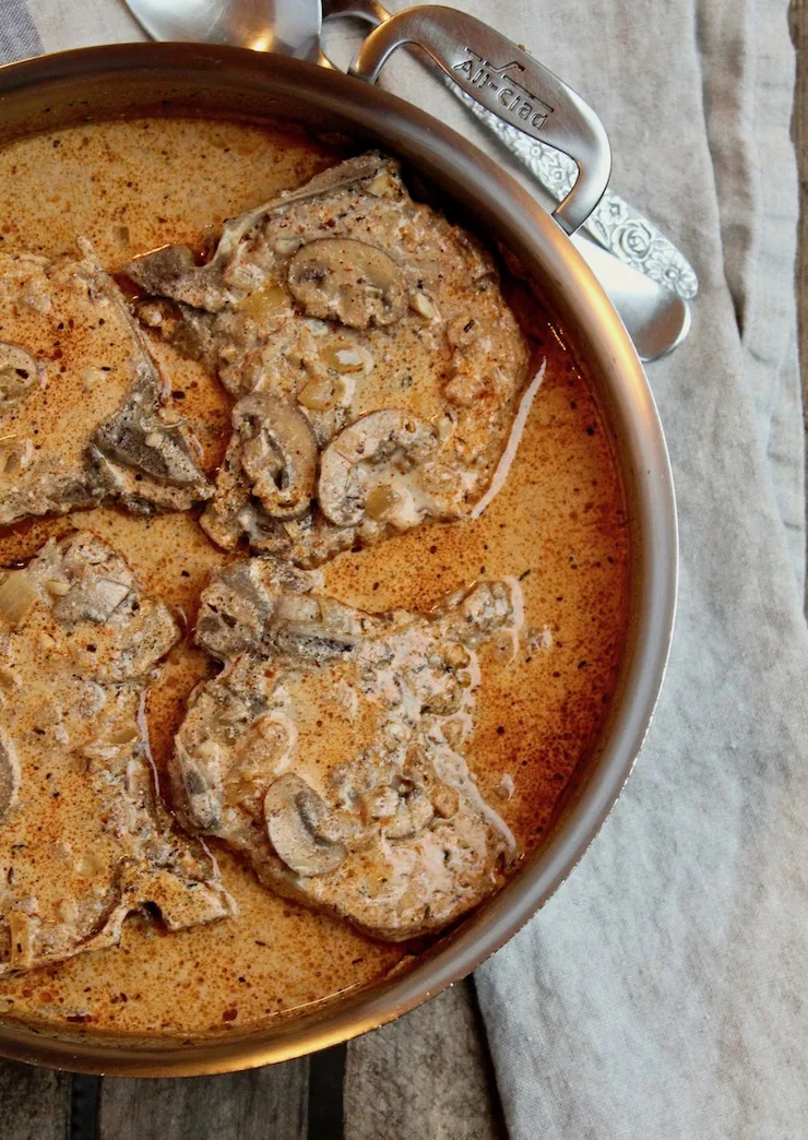 Creamy Cajun Pork Chops, overhead photo in skillet