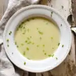 Soup in bowl with snipped chives.