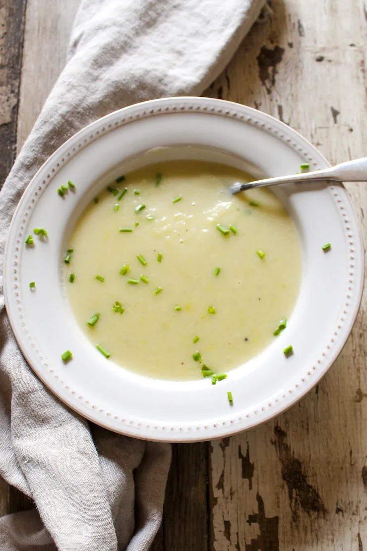 Soup in serving bowl with chives.