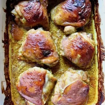No Work Chicken overhead shot of baked thighs in pan