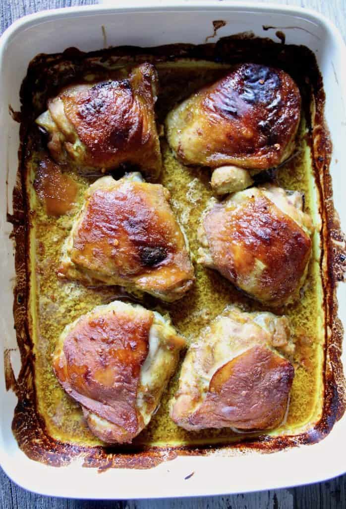 No Work Chicken overhead shot of baked thighs in pan