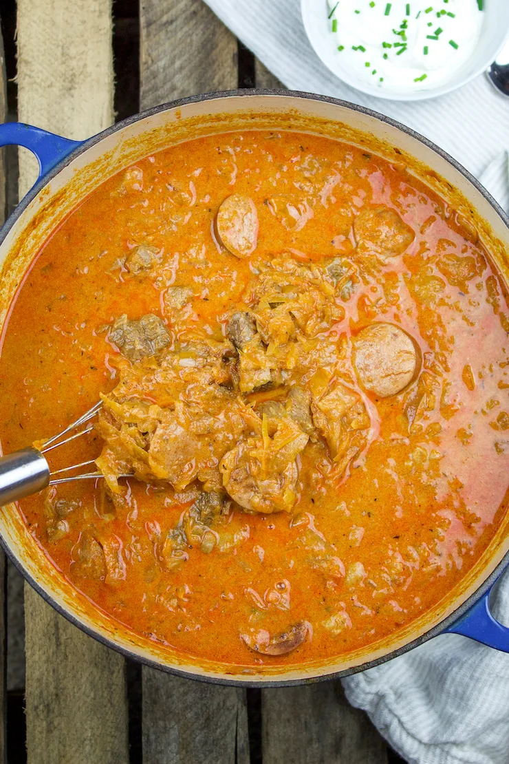 Pot of hungarian pork goulash with sauerkraut.