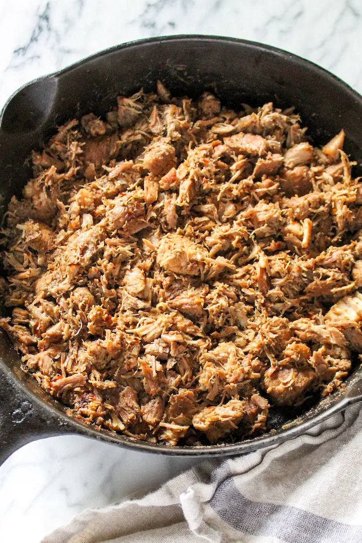 Pork browning in skillet.