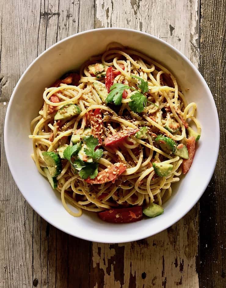 Peanut Sesame Noodles, overhead in white serving bowl.