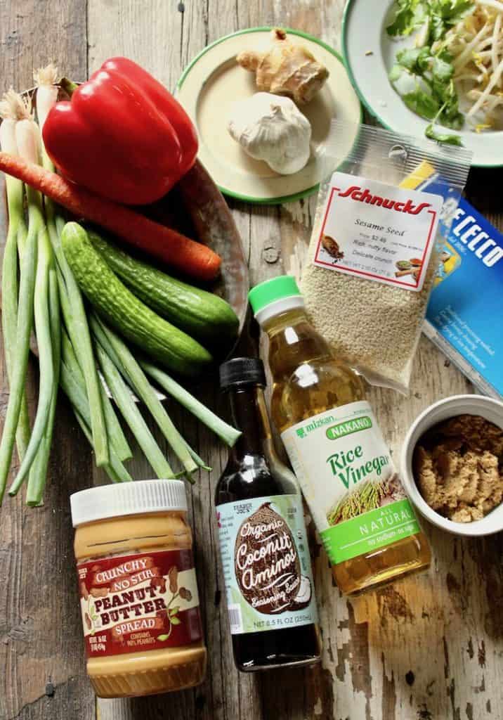 Peanut Sesame Noodles, ingredients laid out on a board.