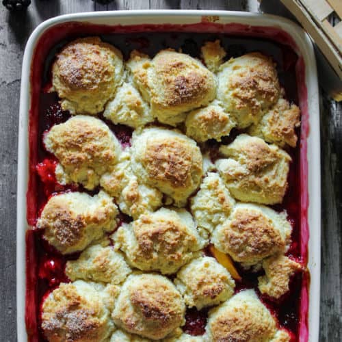 Pan of blackberry peach cobbler.