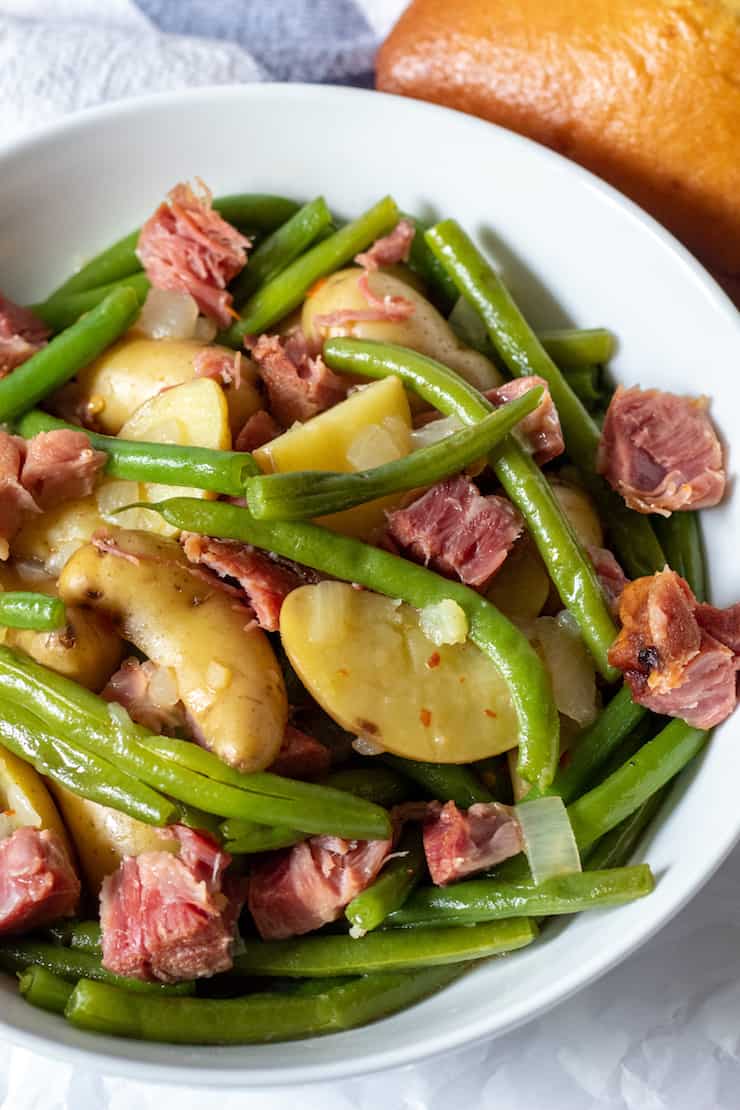 Overhead of green beans and potatoes in bowl.