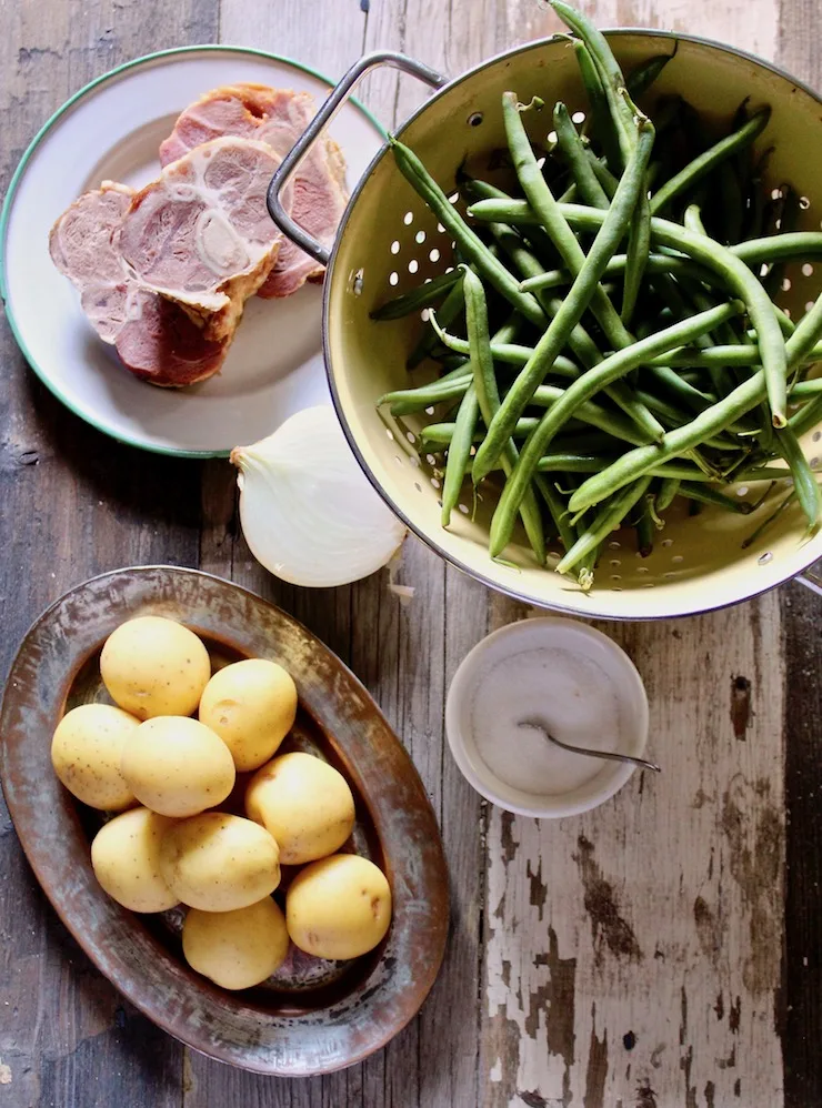 Ingredients photo, fresh green beans, new potatoes, ham shanks and onion.