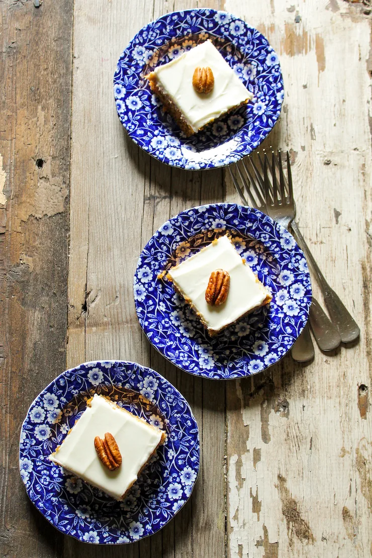 Overhead of three plated pumpkin bars.