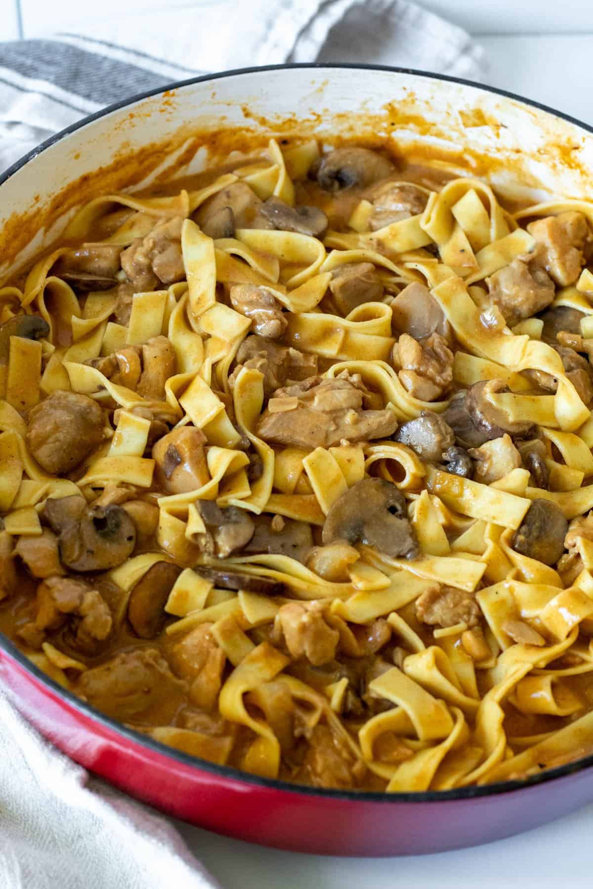 Skillet of chicken stroganoff with egg noodles tossed in.