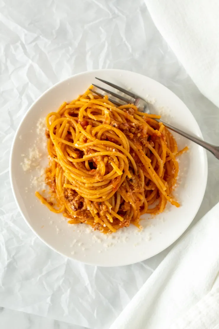 Overhead of spaghetti on white plate