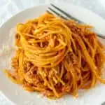 Pinterest pin with text, plate of spaghetti