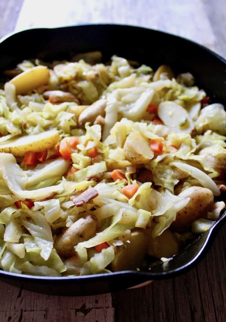 Braised Cabbage and Potatoes, close up in skillet.