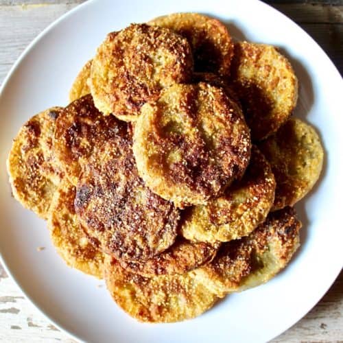 Southern fried green tomatoes on a white plate