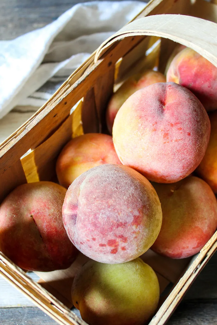 Basket of fresh peaches.