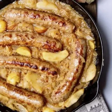 Sausage, Apple, Sauerkraut and Potato Skillet, in cast iron skillet.