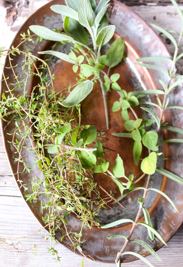 Mixed frsh herbs for compound butter.